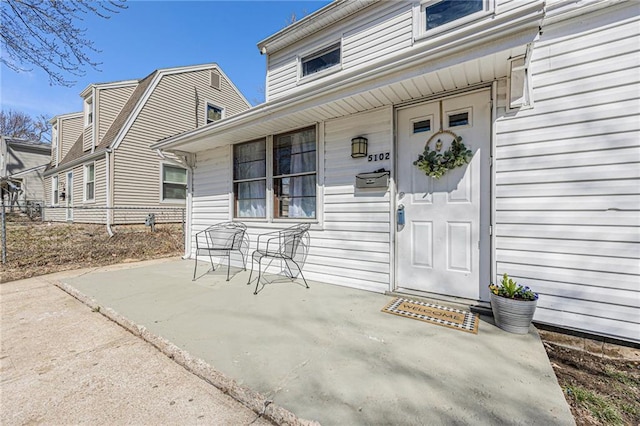 entrance to property with covered porch