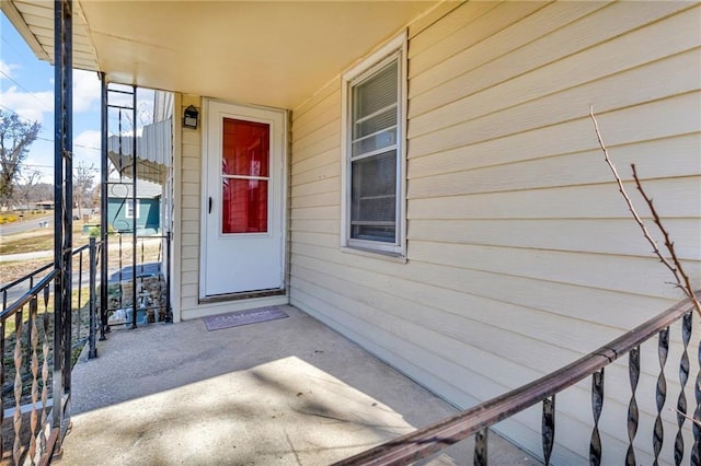 entrance to property with covered porch