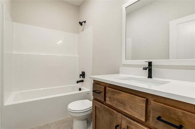3322 Tracy Ave, Kansas City, MO 64109 - bathroom with toilet, washtub / shower combination, vanity, and tile patterned floors