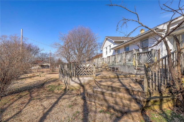 view of yard with a wooden deck