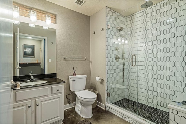 bathroom with a stall shower, visible vents, toilet, tile patterned flooring, and vanity