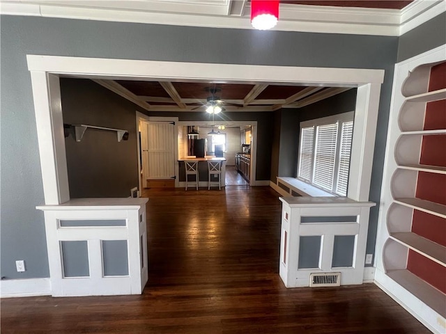 hallway with coffered ceiling, dark wood finished floors, visible vents, and baseboards