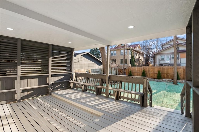 wooden deck featuring fence