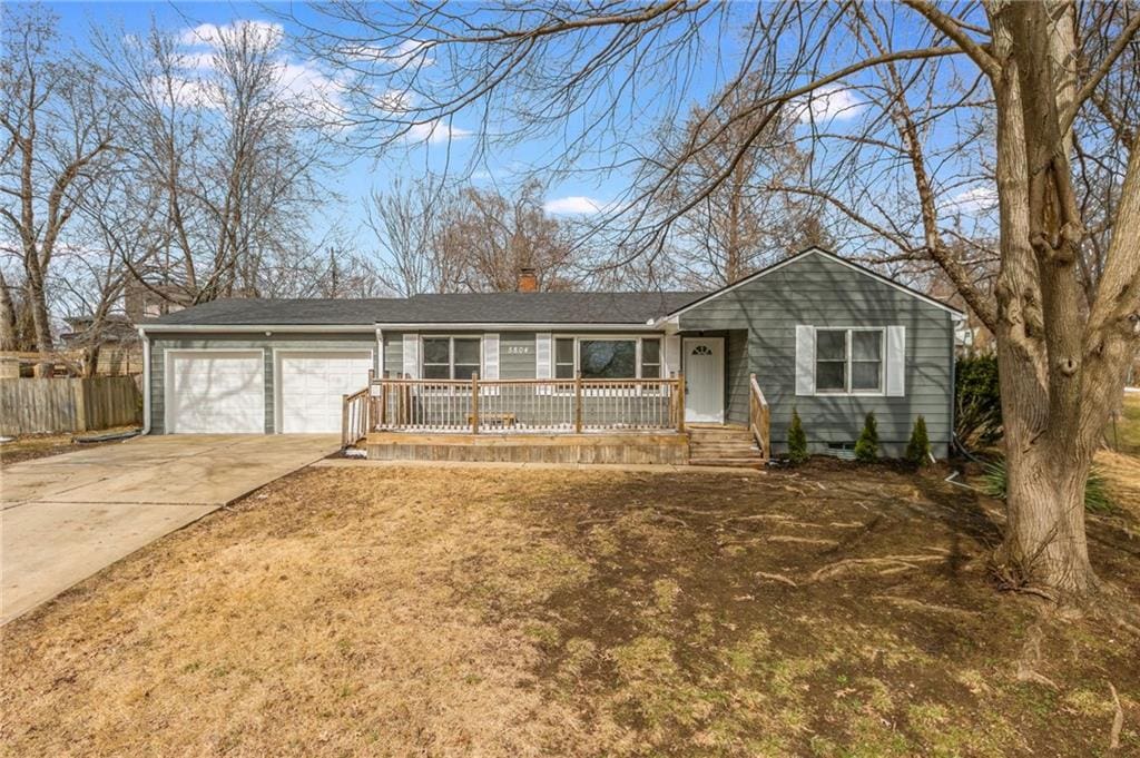 single story home with a garage, concrete driveway, a porch, and fence