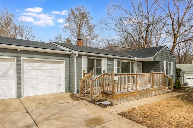 ranch-style home featuring driveway, a chimney, roof with shingles, an attached garage, and a porch