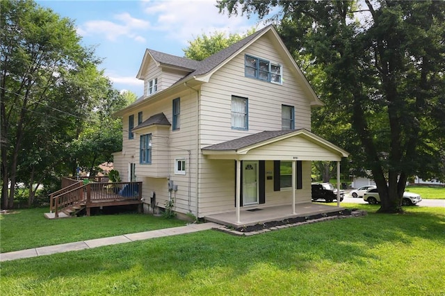 view of front of property featuring covered porch and a front yard