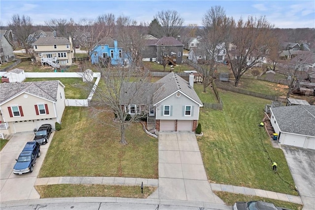 birds eye view of property with a residential view