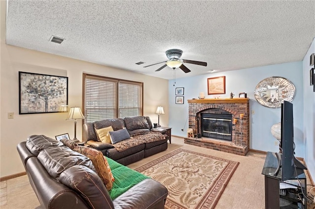 carpeted living room featuring baseboards, a fireplace, and visible vents