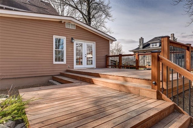 wooden deck with french doors