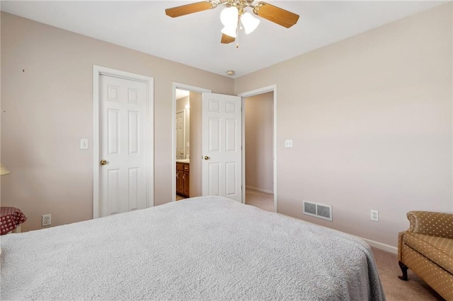 bedroom with visible vents, carpet flooring, baseboards, and ceiling fan