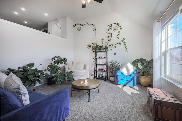 carpeted living room featuring recessed lighting, ceiling fan, and vaulted ceiling