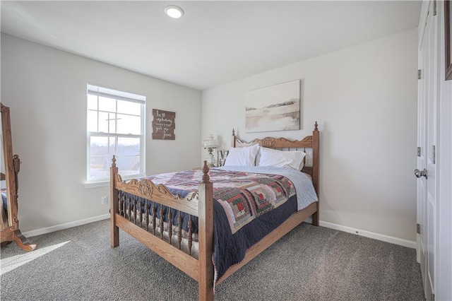 carpeted bedroom with baseboards