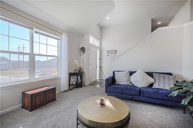 carpeted living room featuring recessed lighting and baseboards