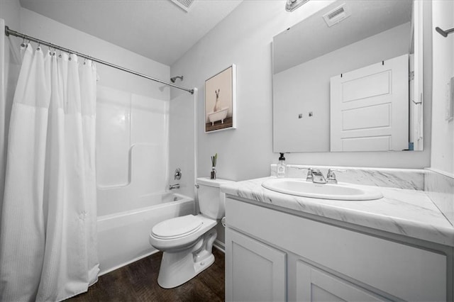 bathroom with toilet, wood finished floors, visible vents, vanity, and shower / bath combination with curtain