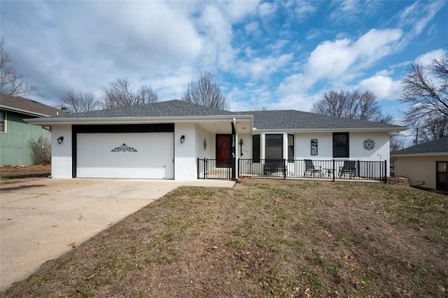 single story home with driveway, brick siding, and an attached garage