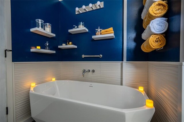 bathroom featuring a freestanding tub