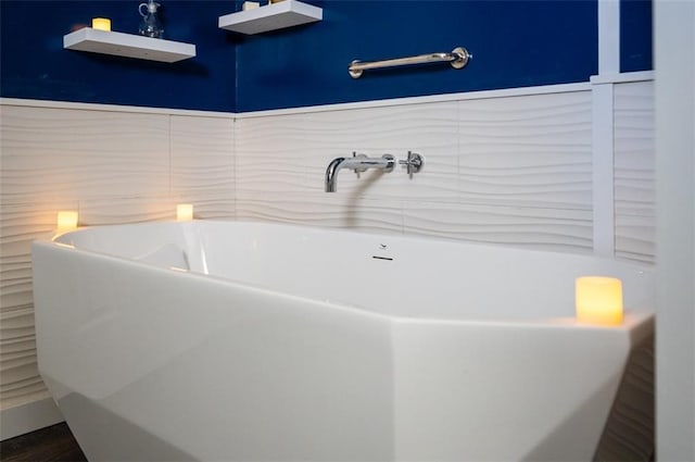 bathroom featuring a freestanding bath