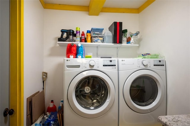 laundry area with laundry area and washer and dryer