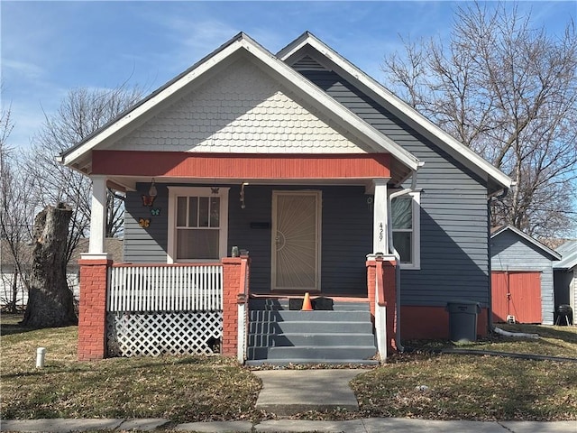 bungalow featuring covered porch