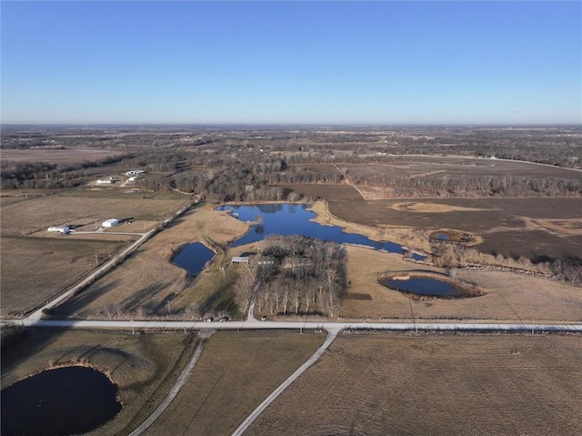 bird's eye view featuring a water view and a rural view