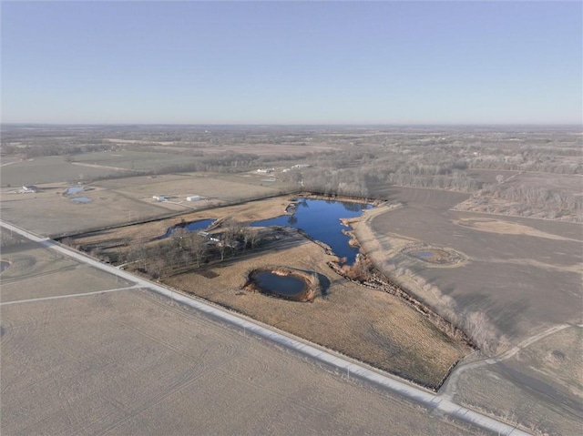 bird's eye view featuring a rural view and a water view