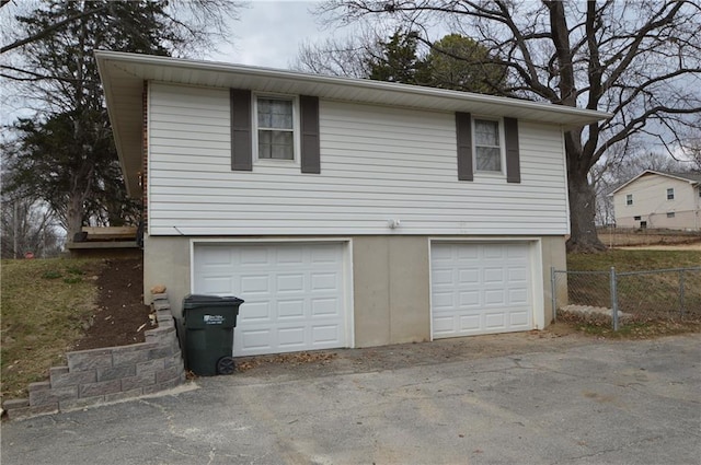 garage featuring fence