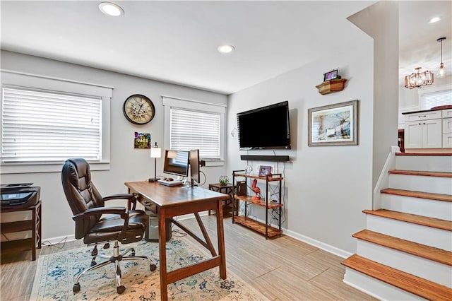 home office featuring a chandelier, recessed lighting, light wood-type flooring, and baseboards