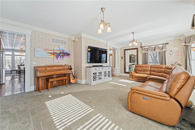 carpeted living area featuring visible vents, wallpapered walls, crown molding, and baseboards