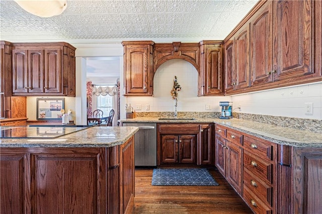 kitchen featuring a sink, light stone counters, stainless steel dishwasher, dark wood finished floors, and black electric stovetop