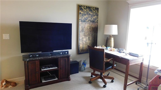 office featuring baseboards and carpet floors