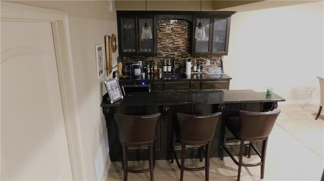 bar with a bar and decorative backsplash