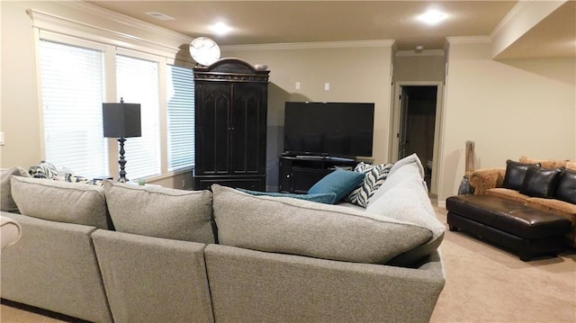 living area with crown molding and carpet floors