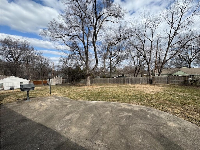 view of yard with a patio area and fence