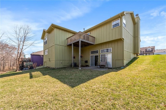 back of house with a yard