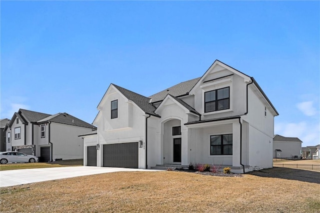 modern inspired farmhouse featuring a residential view, a front yard, stucco siding, a garage, and driveway