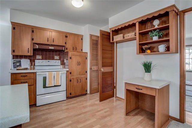 kitchen featuring white electric stove, open shelves, under cabinet range hood, and light countertops