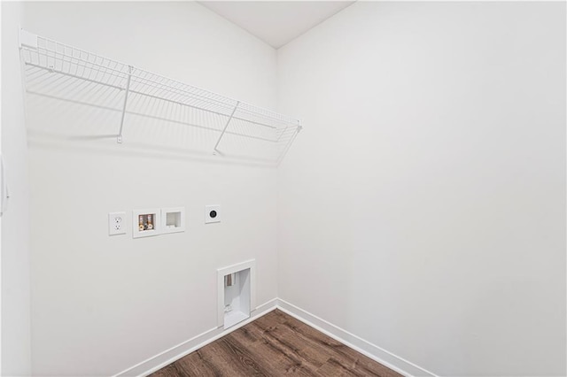 washroom with laundry area, baseboards, dark wood finished floors, hookup for a washing machine, and electric dryer hookup