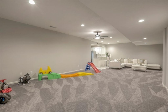 rec room with carpet, recessed lighting, visible vents, a ceiling fan, and baseboards