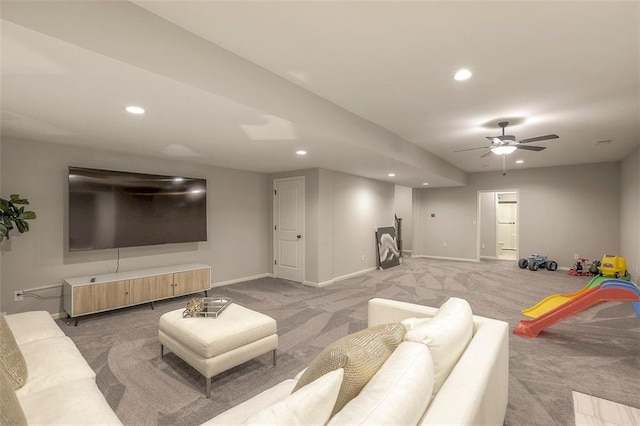 living room featuring recessed lighting, carpet flooring, a ceiling fan, and baseboards