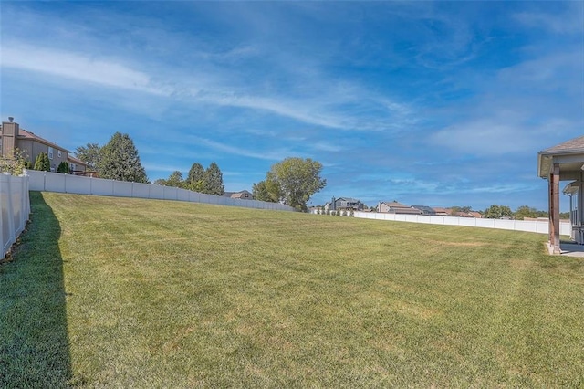 view of yard with fence