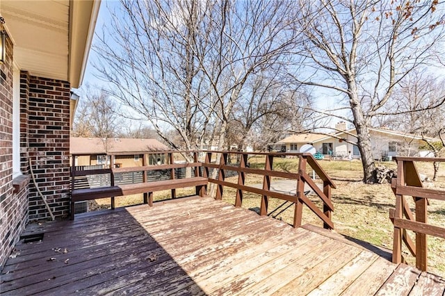 wooden terrace with a residential view