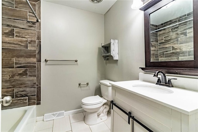 bathroom featuring tile patterned flooring, toilet, vanity, visible vents, and baseboards