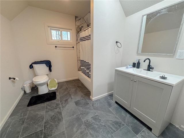 bathroom featuring baseboards, toilet, a shower with curtain, lofted ceiling, and vanity