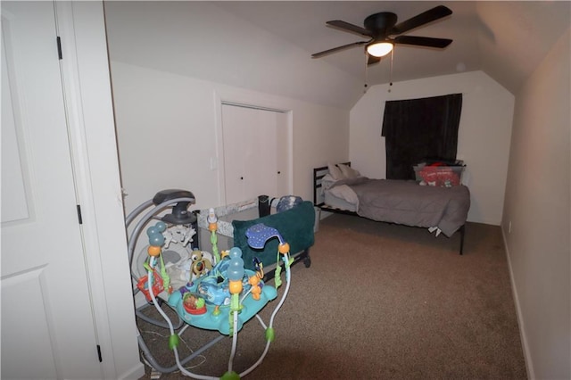 carpeted bedroom with vaulted ceiling and ceiling fan