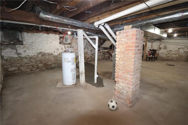 unfinished basement featuring water heater