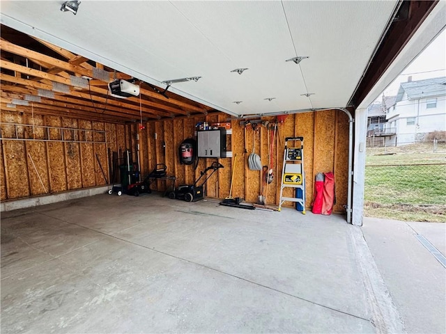 garage featuring a garage door opener