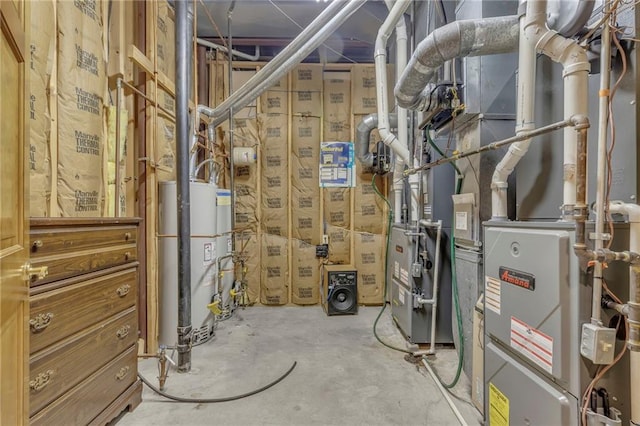 utility room with gas water heater