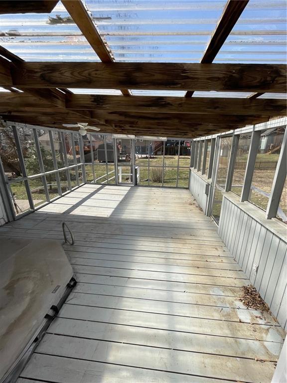 wooden terrace with glass enclosure