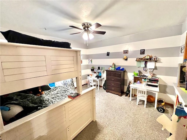 bedroom featuring carpet floors and a ceiling fan