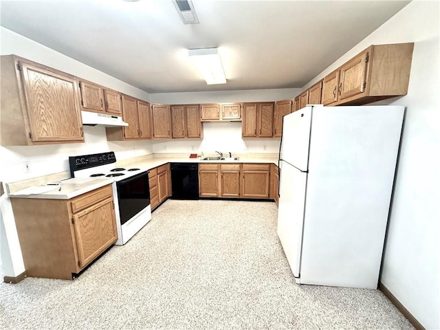 kitchen featuring visible vents, dishwasher, electric stove, freestanding refrigerator, and under cabinet range hood